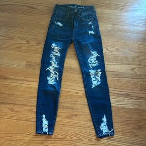 American Eagle dark-wash, distressed, skinny jeans. Size 00 short.